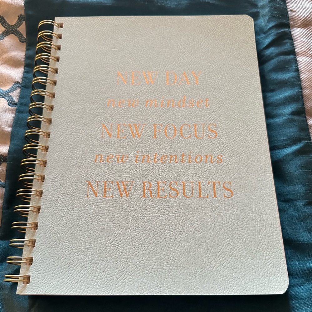Fringe 192 lined-pages notebook. Mint green color with gold lettering on front.